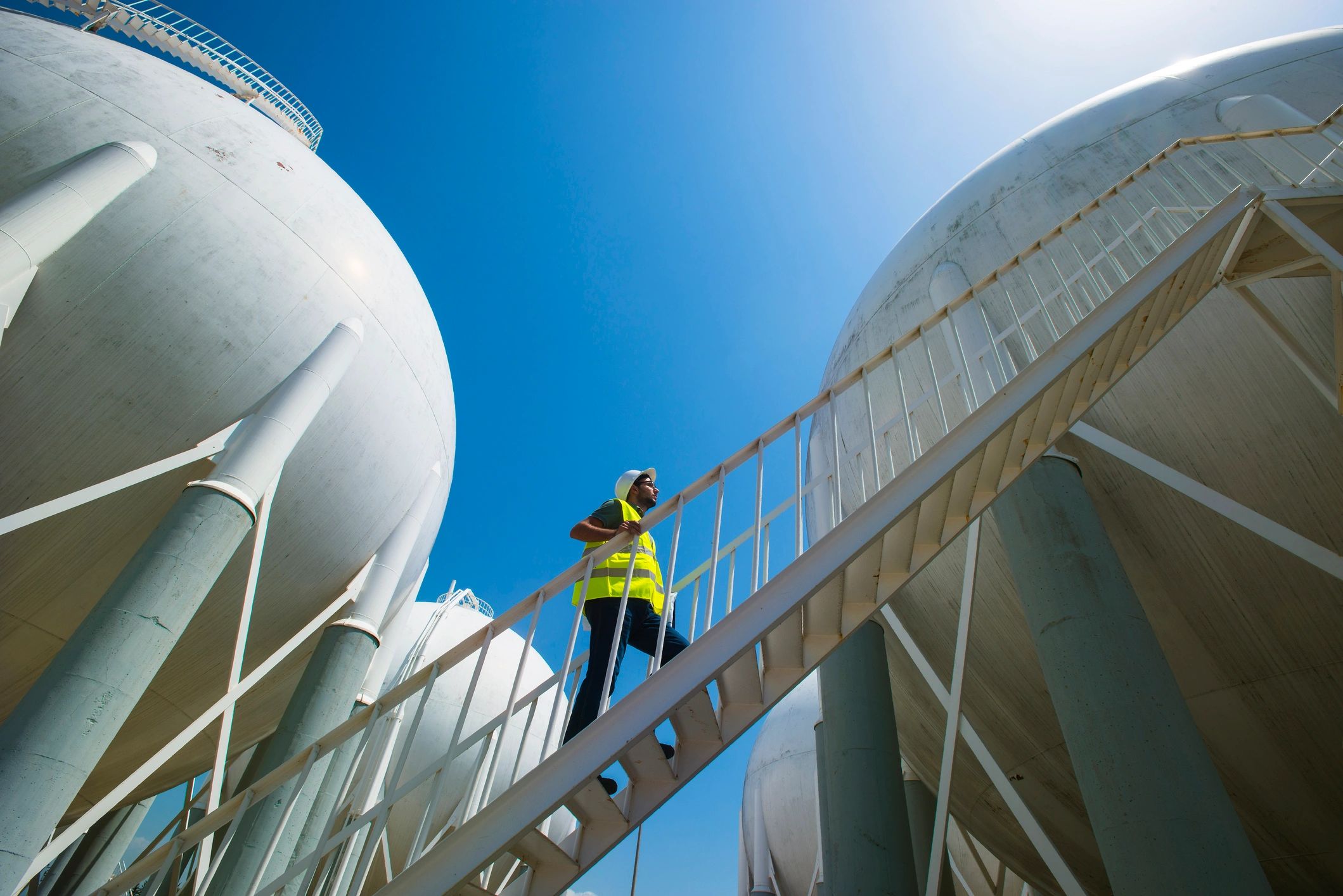Industrial worker at storage tanks facility