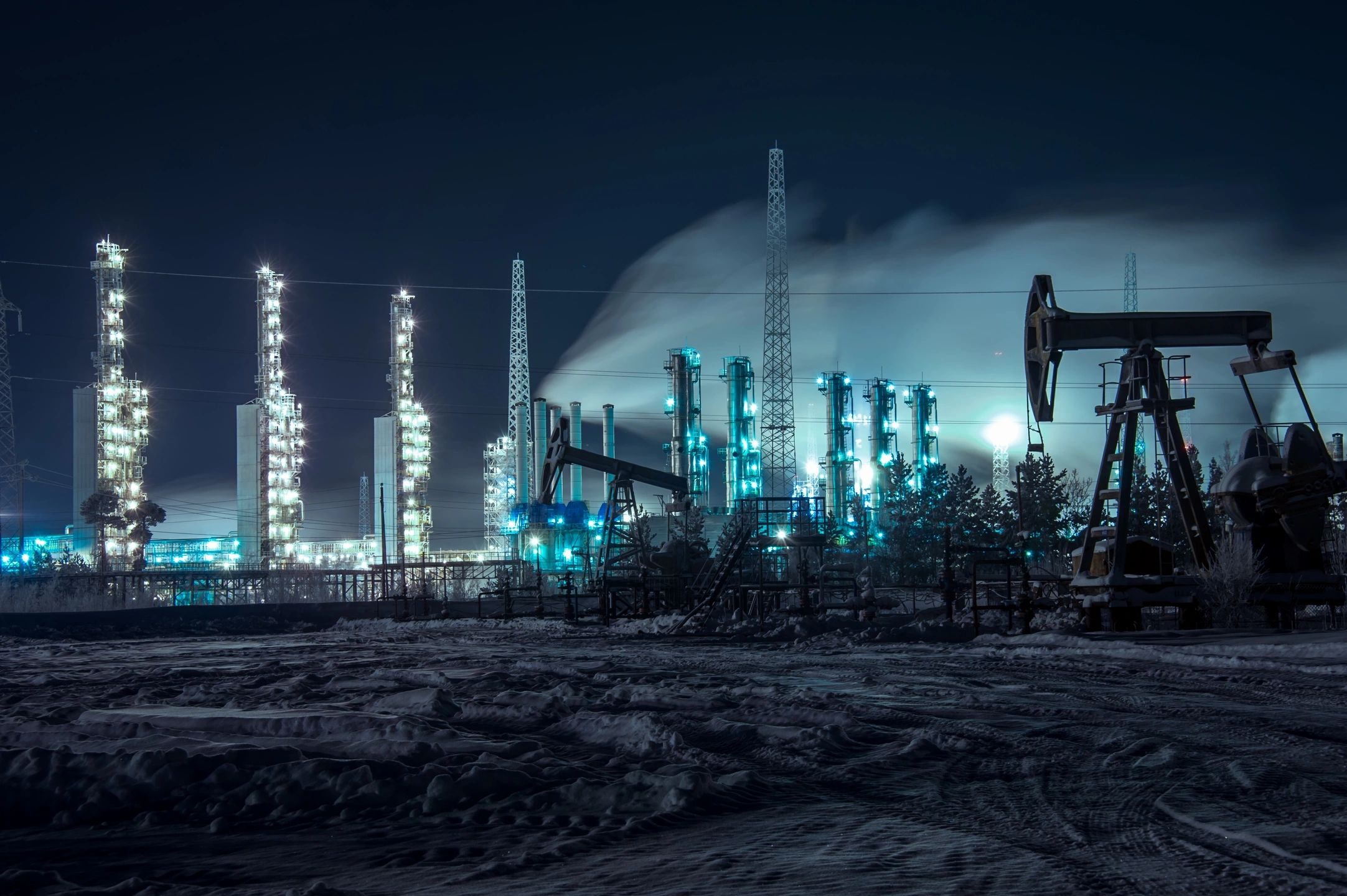 Oil refinery illuminated at night